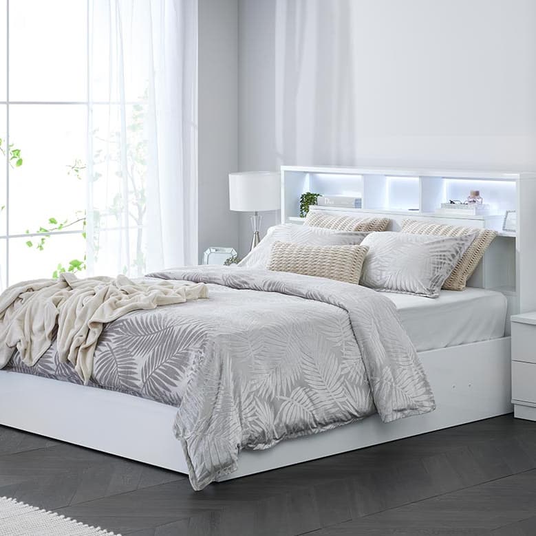 Lifestyle image of the  Argo Gloss White Qb Bed W/Gas Lift & End Drawer Base from Forty Winks