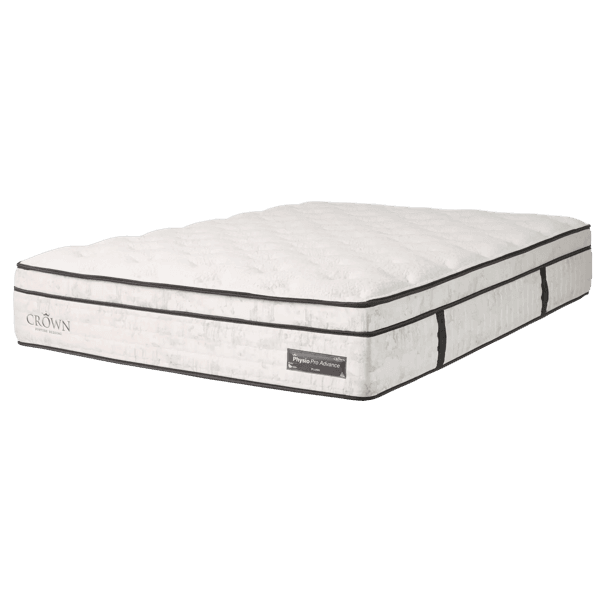 Mattress on a bed base in a styled bedroom