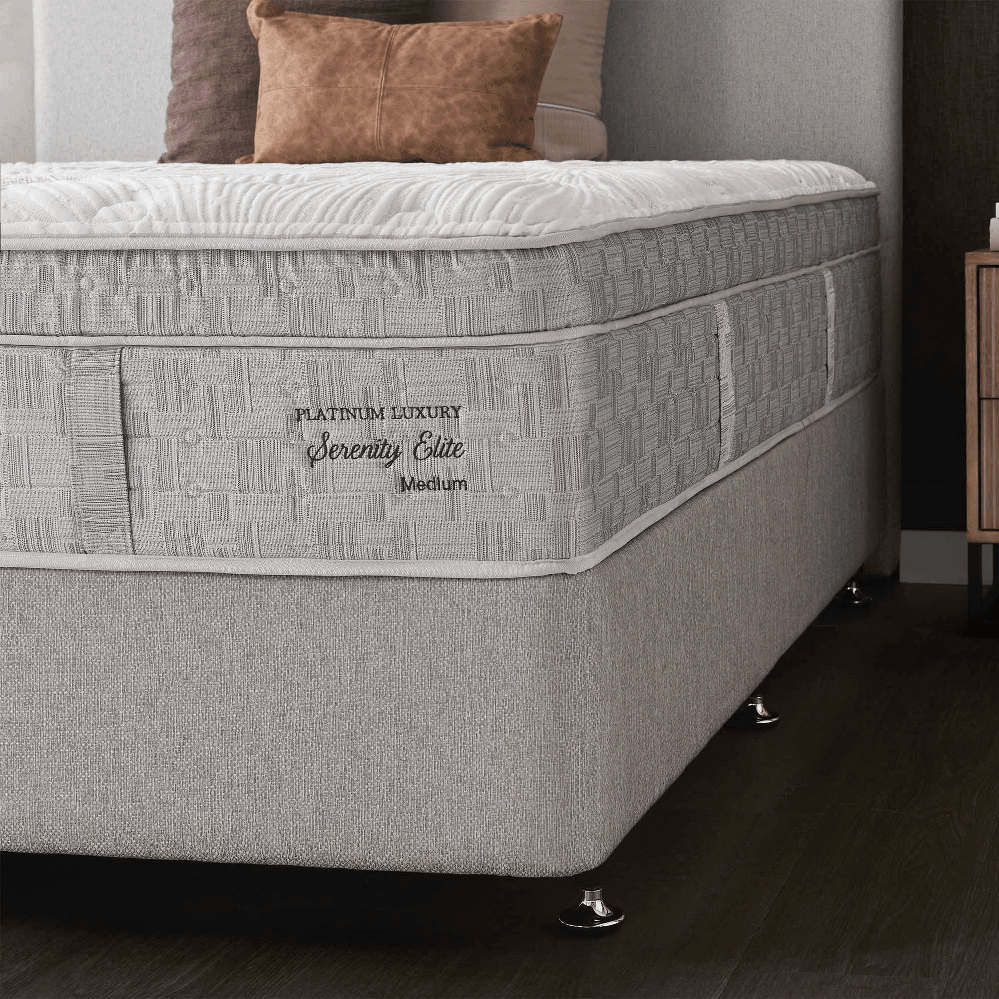 King Koil Platinum Luxury Serenity Elite Mattress styled on an ensemble base in a bedroom