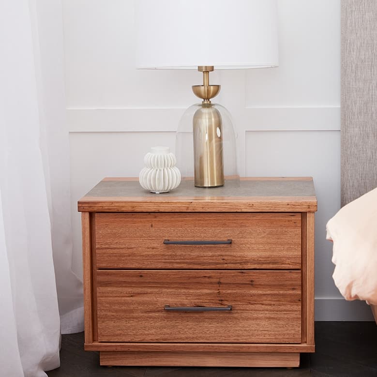 Lifestyle image of the Alexa Bedside Table 2 Drawer W/Stone Top (Native) from Forty Winks