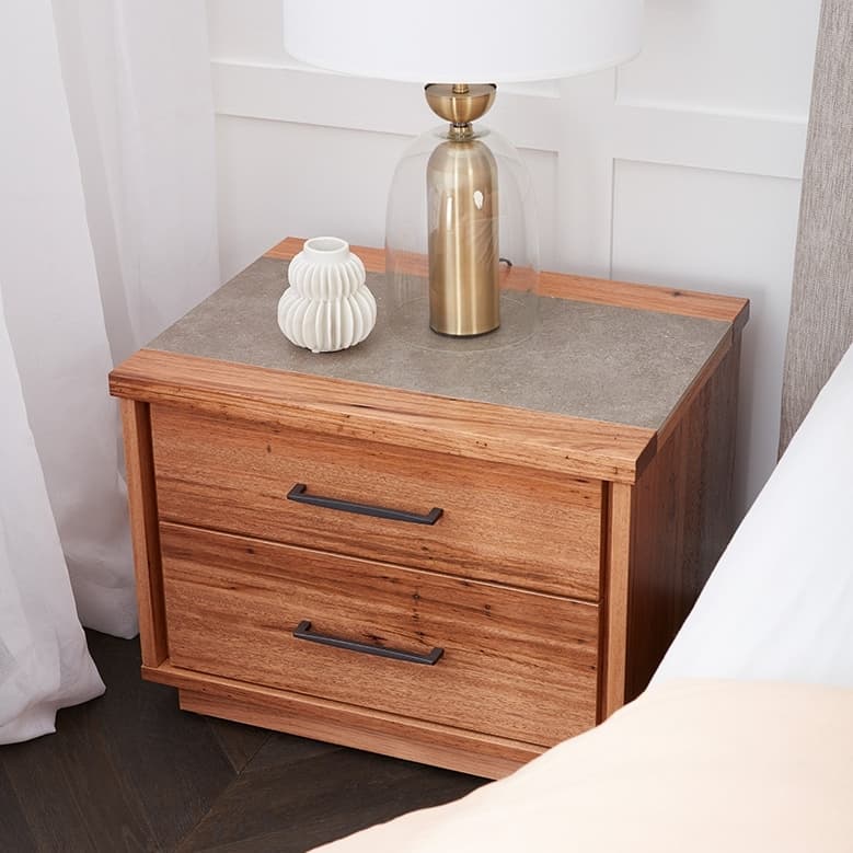 Lifestyle image of the Alexa Bedside Table 2 Drawer W/Stone Top (Native) from Forty Winks