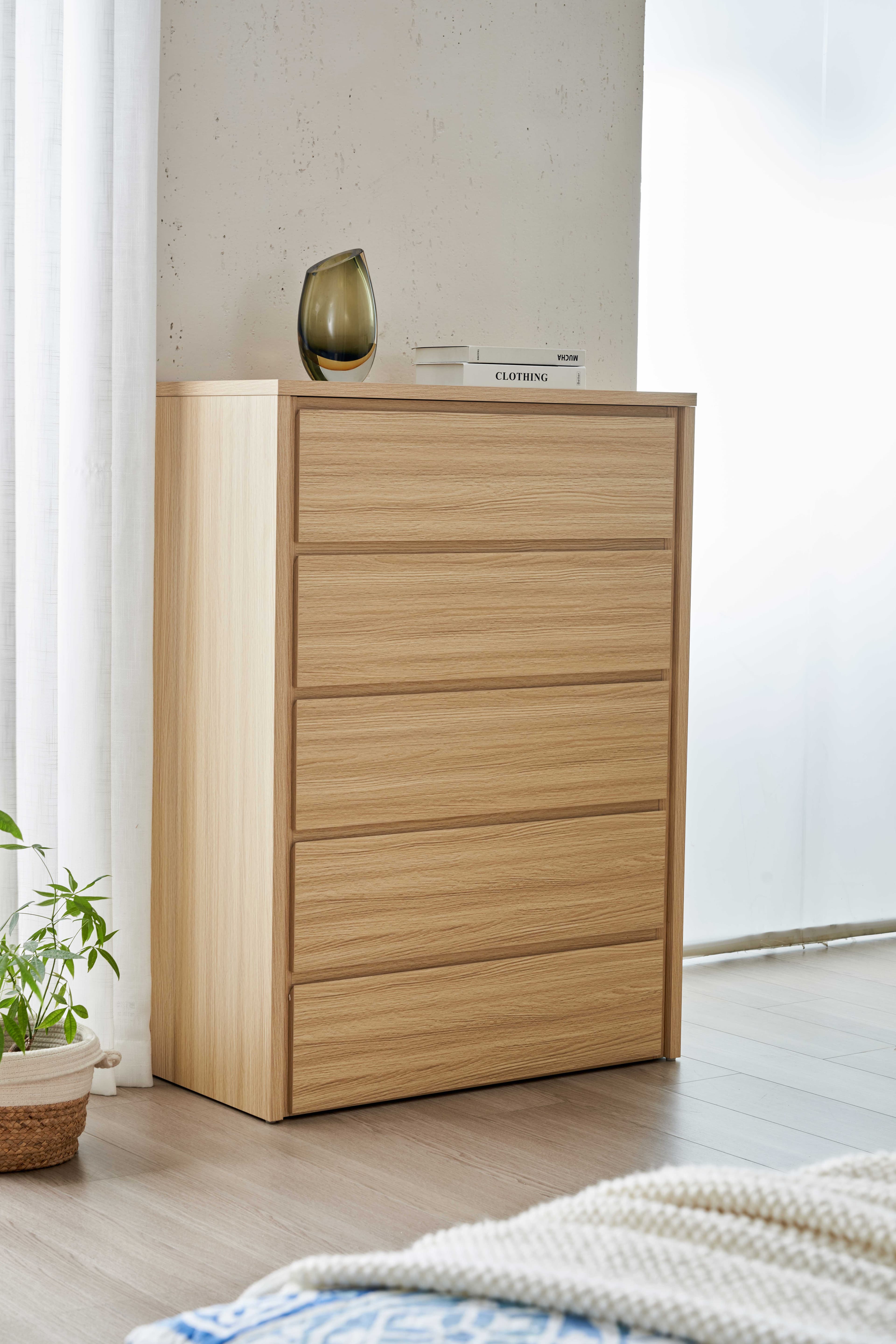 Lifestyle image of the Nova Alpine Oak Tallboy 5 Drawer from Forty Winks